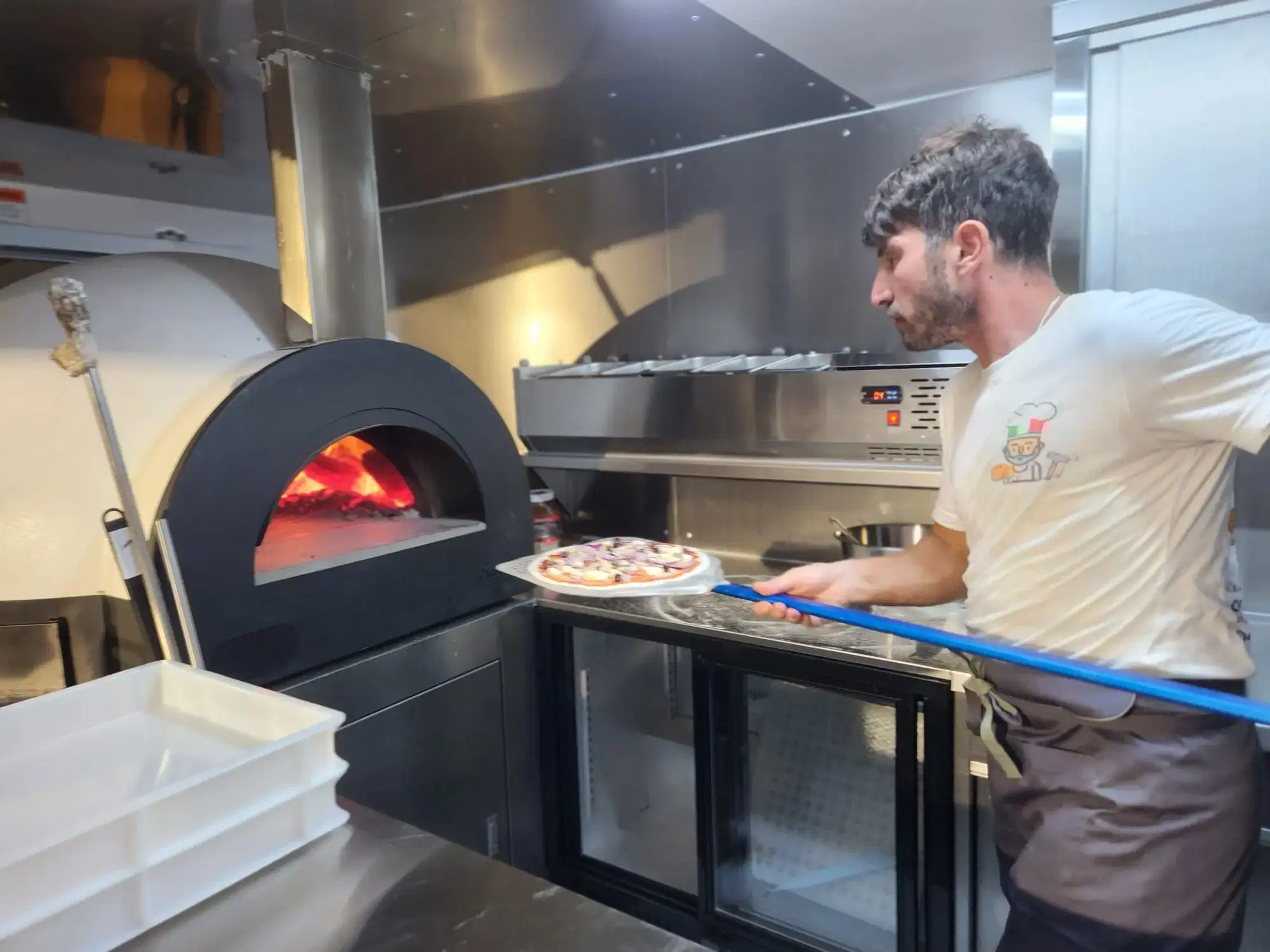 Our pizzaiolo by the oven